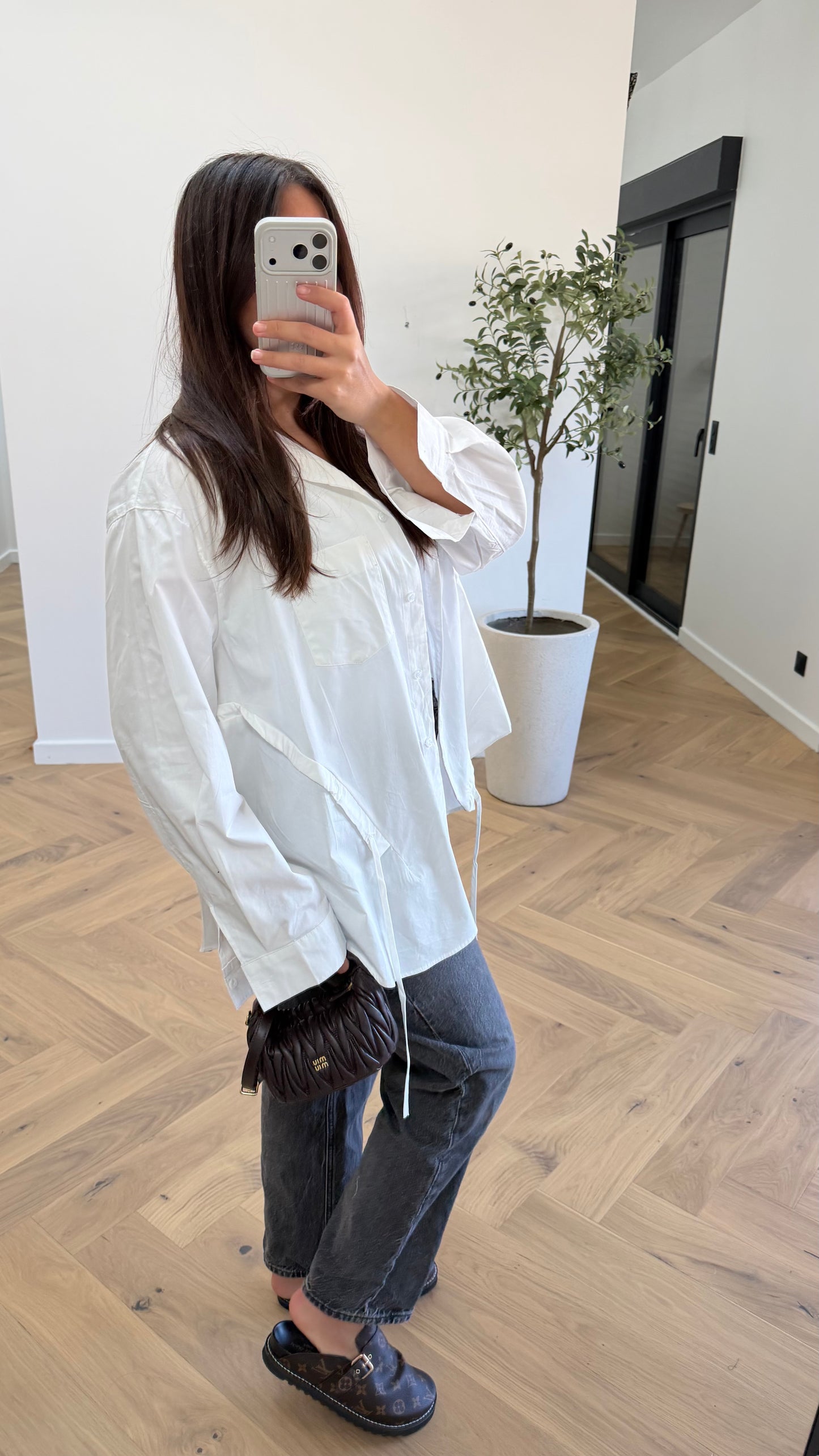 Chemise blanche à détails