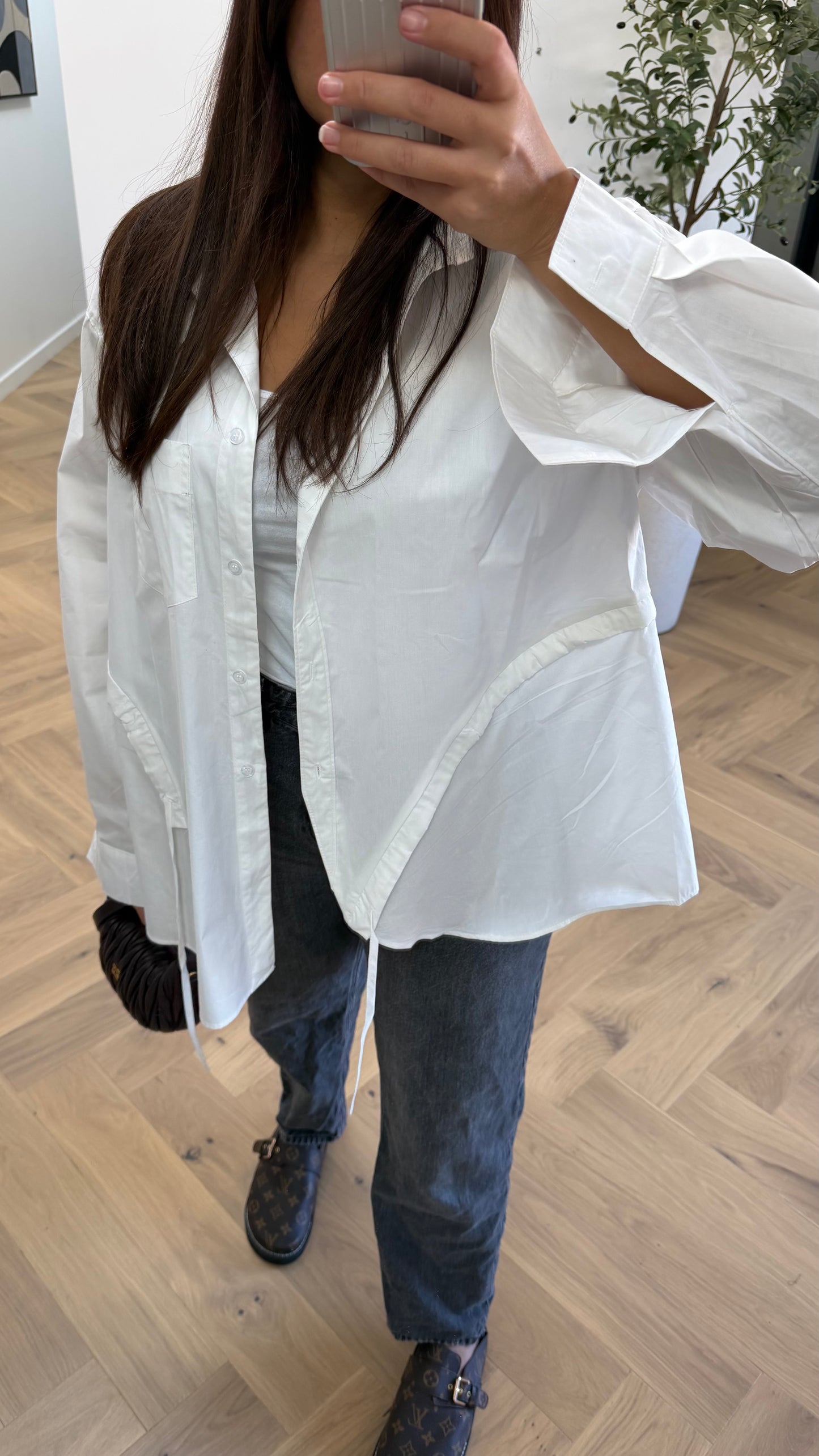 Chemise blanche à détails