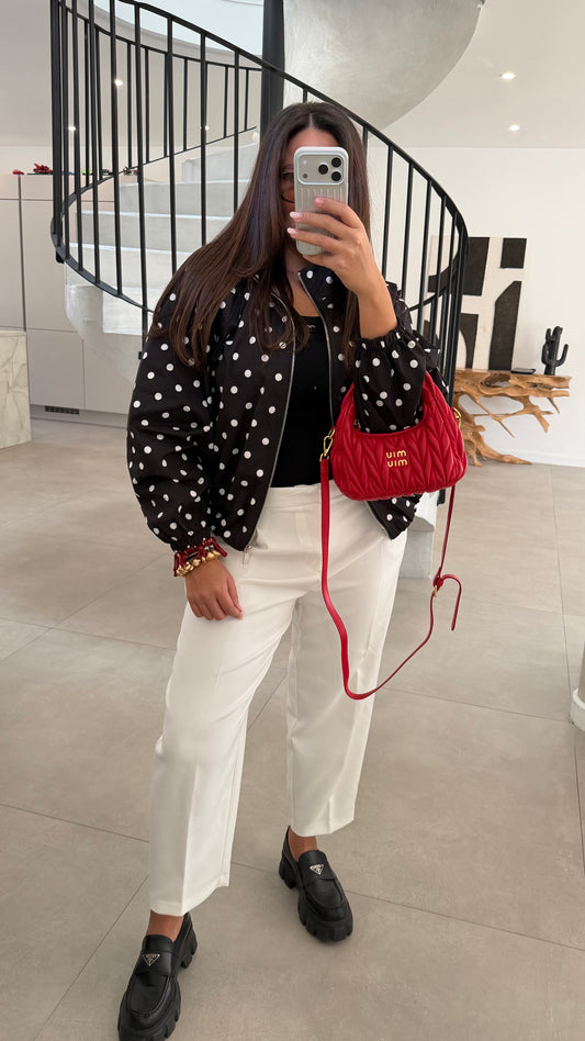 Veste à pois noir