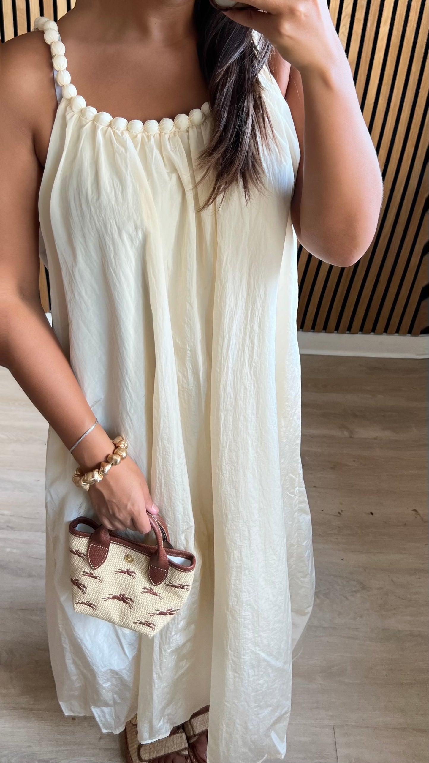 Robe écru à détails