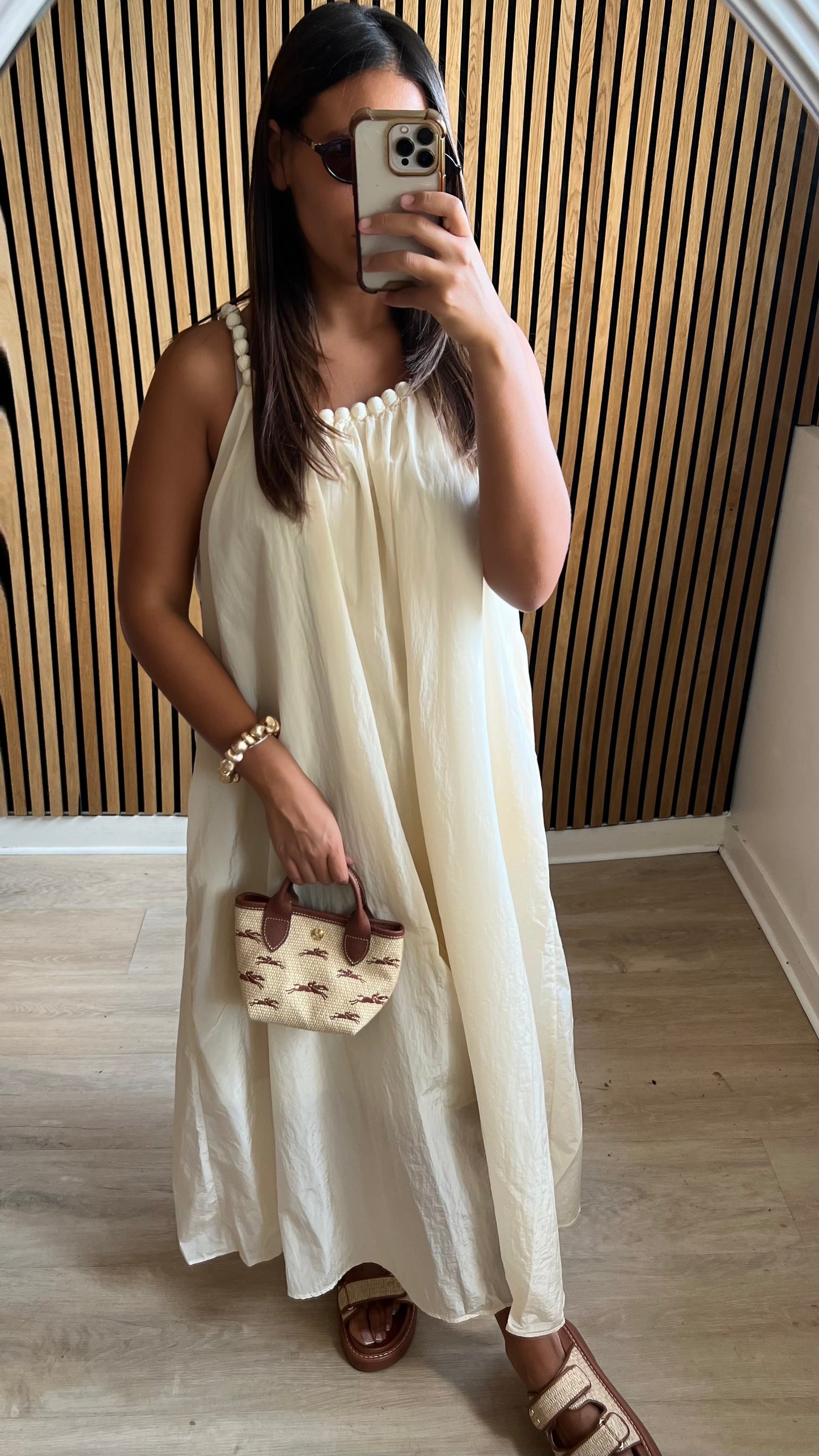 Robe écru à détails