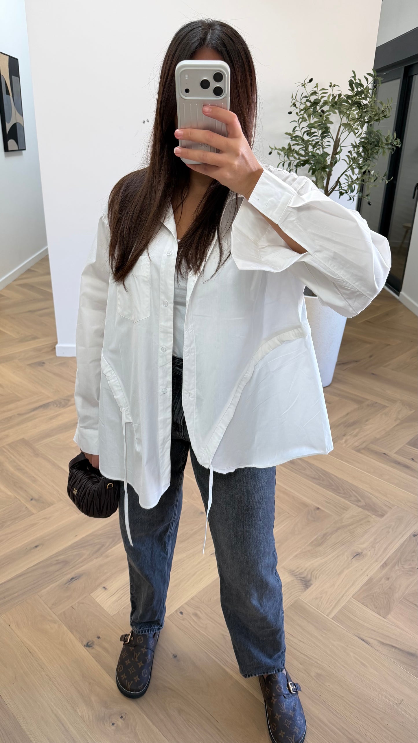 Chemise blanche à détails