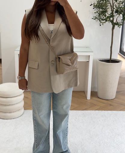 Blazer beige sans manche avec fente arrière